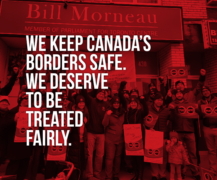 Picture of demo in front of Morneau's office in Toronto stating "We keep Canada's borders safe. We deserve to be treated fairly"