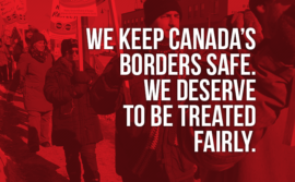 Picture of a demo in Thunder Bay stating "We keep Canada's borders safe. We deserve to be treated fairly"