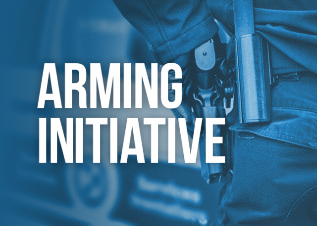 Arming Initiative Featured Image, depicting the hand of a BSO on a holstered firearm